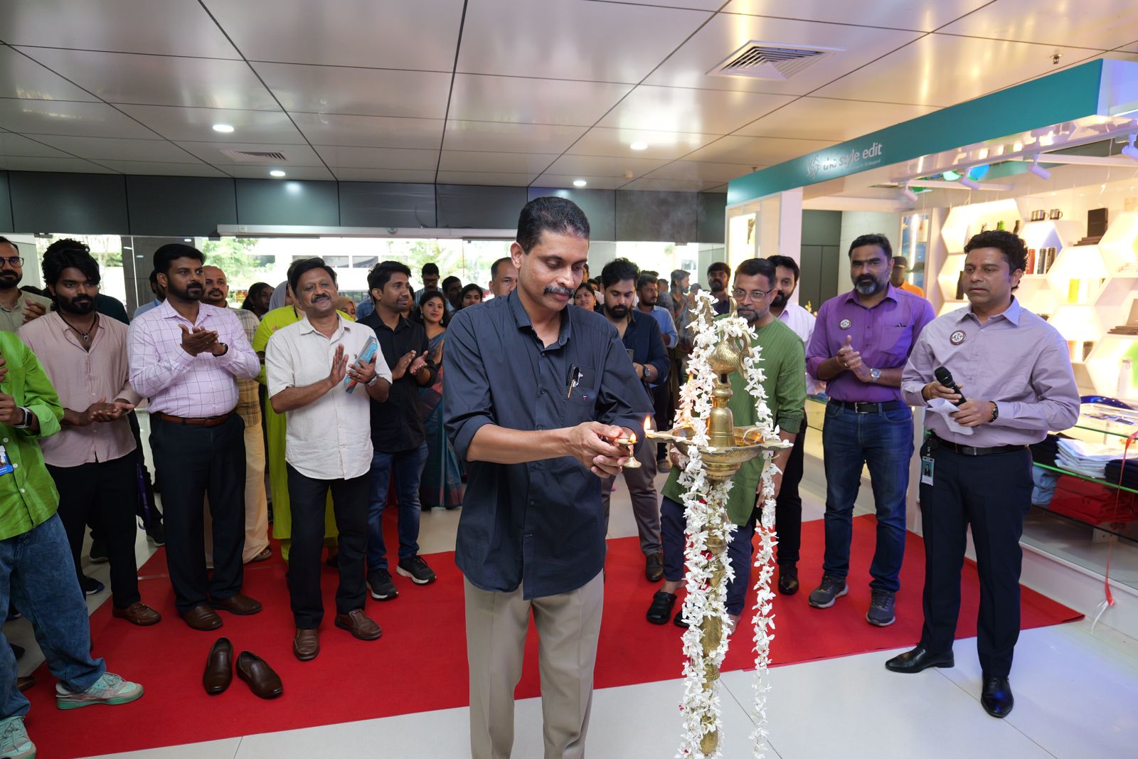 Mr. Shaiju N Lal, Registrar, lighting the inaugural lamp.