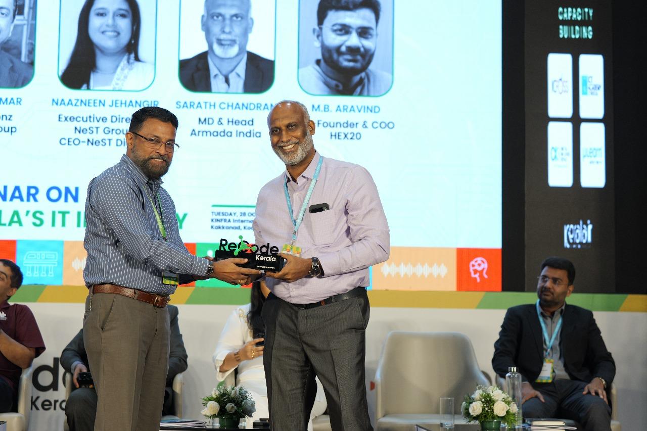 Col. Sanjeev S. N.(Retd.), CEO Technopark, honoring Sarath Chandran- MD & Head, Armada India.